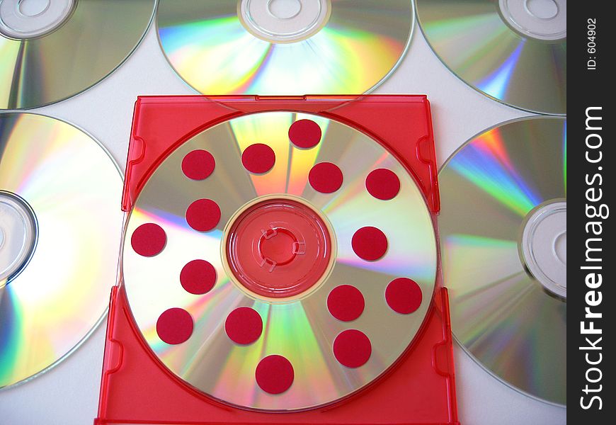 Conceptual idea of using red dots to represent the presence of computer viruses on a disc. Conceptual idea of using red dots to represent the presence of computer viruses on a disc