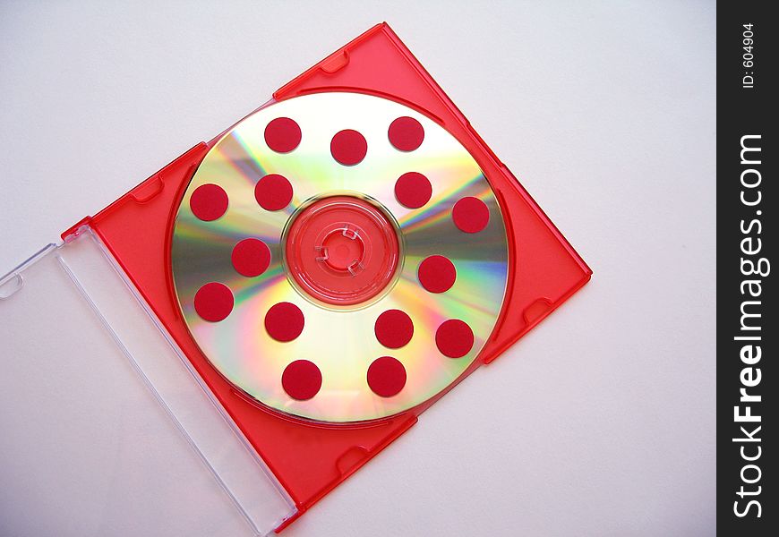 Conceptual idea of using red dots to represent the presence of computer viruses on a disc. Conceptual idea of using red dots to represent the presence of computer viruses on a disc