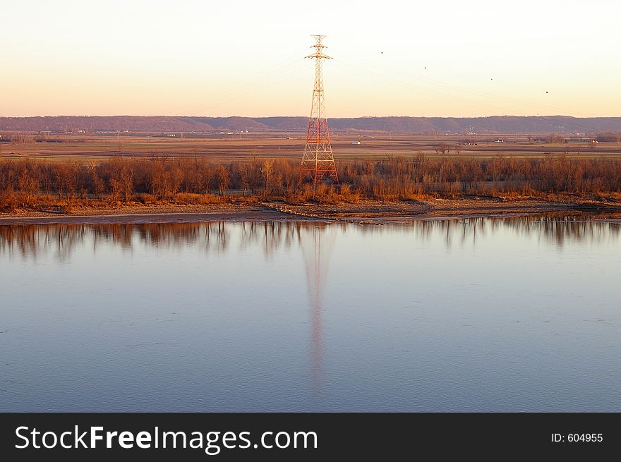 View from an overlook in Missouri looking across the Mississippi river into Illinois farmland during autumn. View from an overlook in Missouri looking across the Mississippi river into Illinois farmland during autumn.