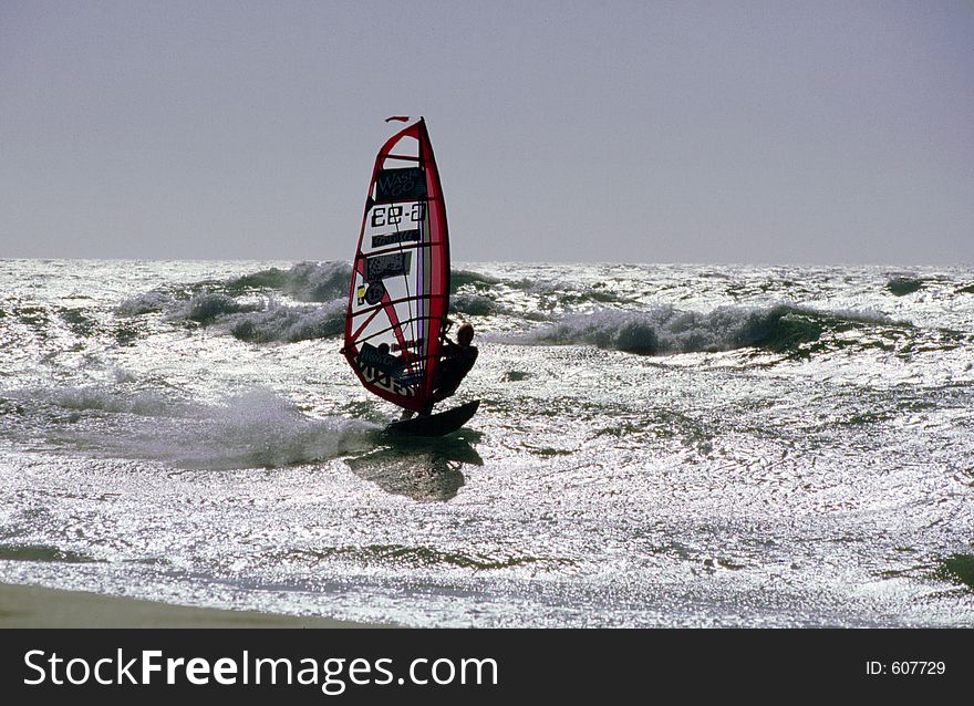 Guincho Beach, Cascais, Portugal,E.U.. This an excelent windy beach for water sports like windsurf,surf as well as kitesurf,internationaly known and visited every year.Many international contests are made here.