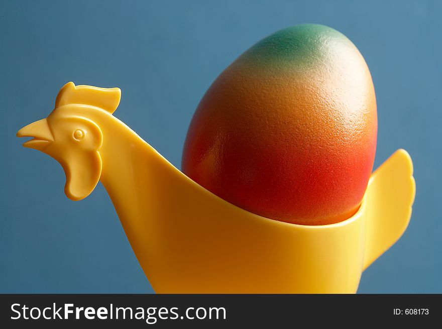 One chicken- eggcup wiht a coloured egg -. One chicken- eggcup wiht a coloured egg -