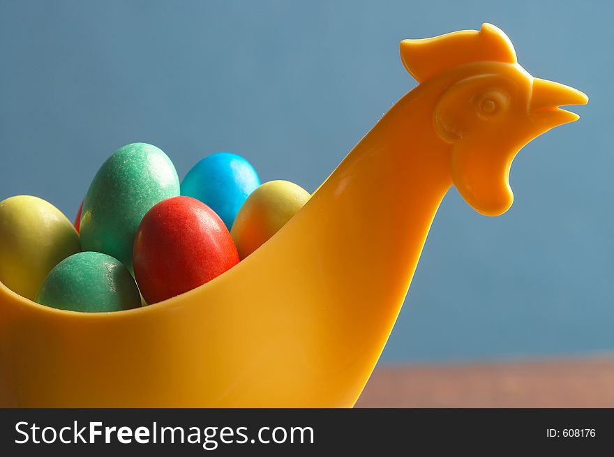 Yellow plastic- chicken with little choco eggs in it. Yellow plastic- chicken with little choco eggs in it