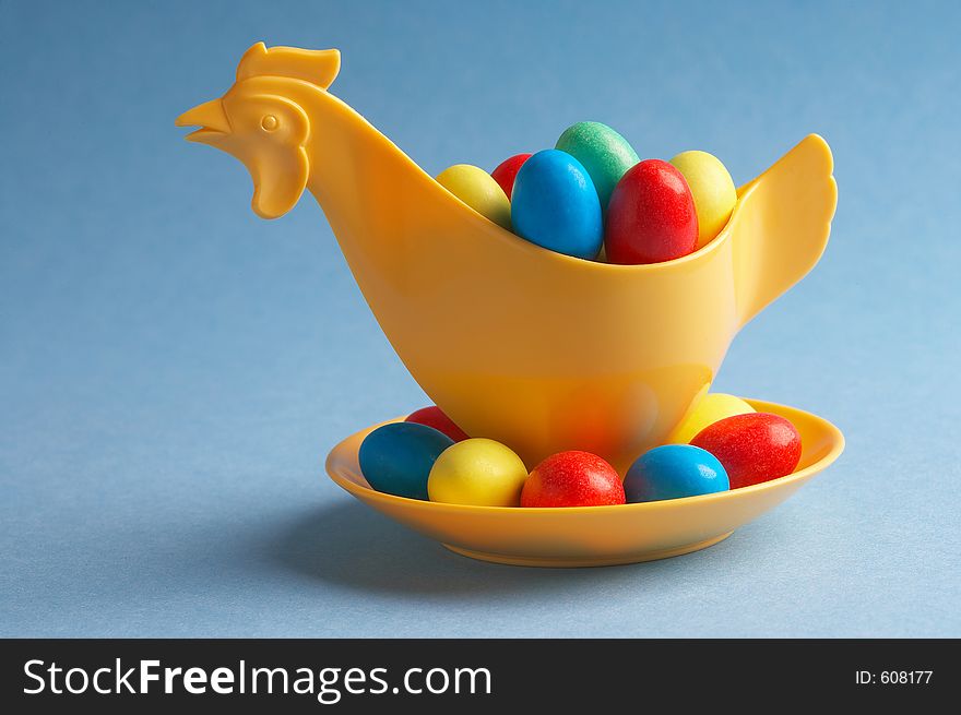Yellow plastic- chicken with little choco eggs in it. Yellow plastic- chicken with little choco eggs in it