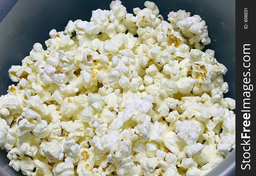 Buttered popcorn in a bowl.