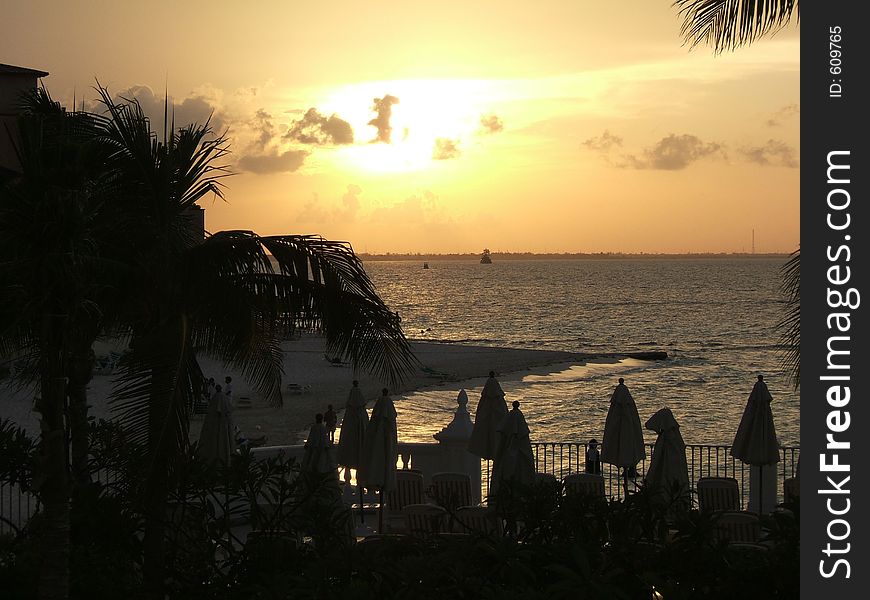 Sunset in Cancun, Mexico at a beach-side resort. Sunset in Cancun, Mexico at a beach-side resort