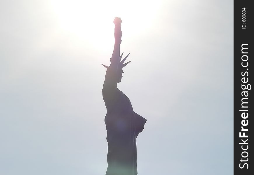 Liberty statue in blazing sun