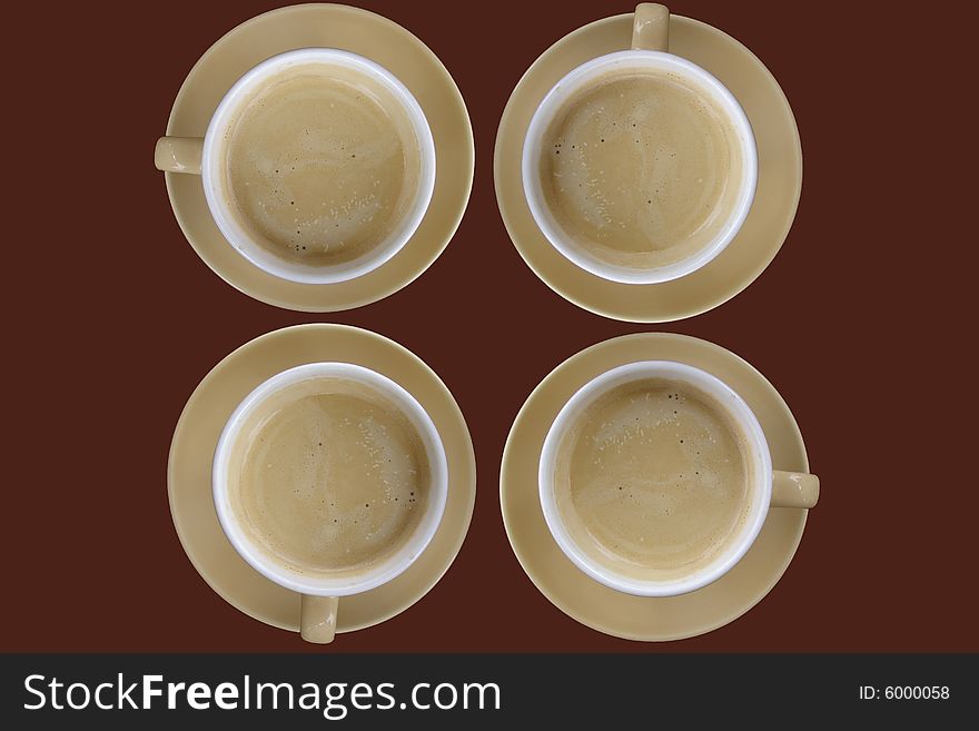 Four cups of coffee seen from the top