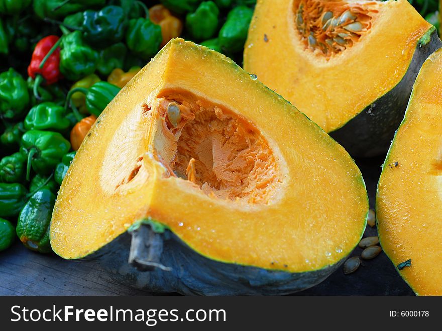 Fresh yellow pumpkin and  green and red peppers, . Fresh yellow pumpkin and  green and red peppers, .