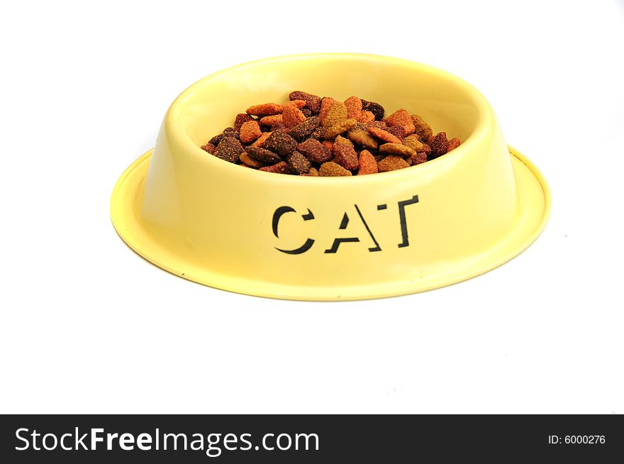 Shot of a cats feeding bowl with biscuits in. Shot of a cats feeding bowl with biscuits in