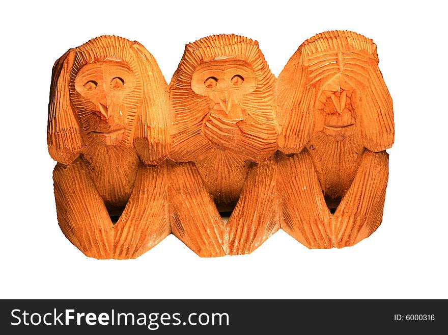 Three wooden monkeys sitting down