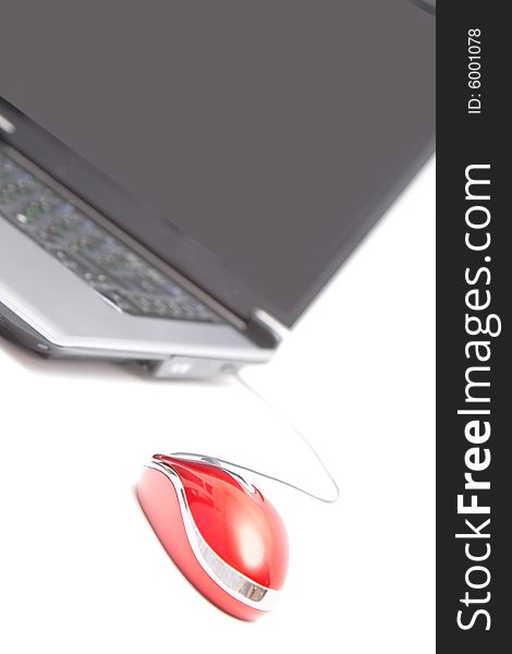 Personal computer and red mouse over white