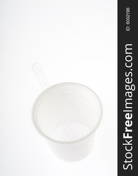 Plastic coffee cup on a white background