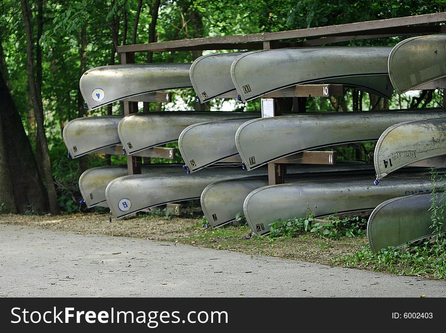 Bunch of canoes waiting to be rented. Bunch of canoes waiting to be rented