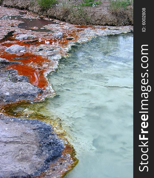 This pic was taken at Thermopolis, Wyoming - world\'s largest mineral hot springs.  This was the most colorful deposit I noticed - the rest seemed to lack the vibrant splash of red-orange. This pic was taken at Thermopolis, Wyoming - world\'s largest mineral hot springs.  This was the most colorful deposit I noticed - the rest seemed to lack the vibrant splash of red-orange.