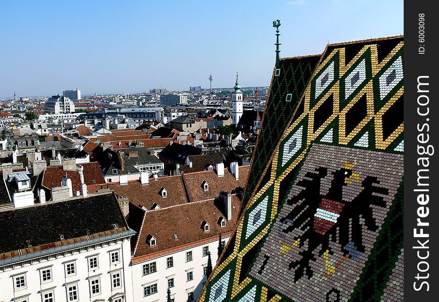 St. Stephan Cathedral roof and city view from height of the bird`s flight. St. Stephan Cathedral roof and city view from height of the bird`s flight