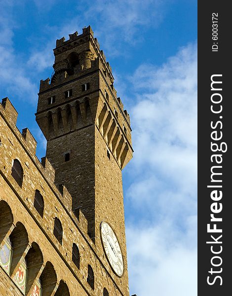 Tower of the Palazzo Vecchio against a blue sky, Florence, Italy