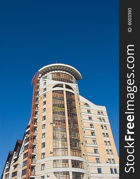 Modern Brick Multistory House On Deep Blue Sky Bac