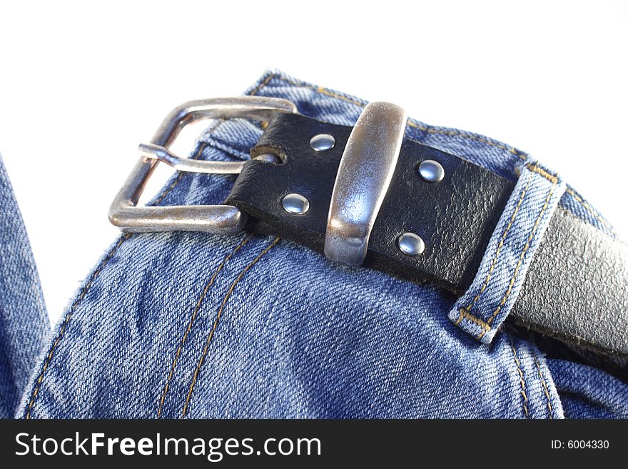 Pair of jeans with black belt isolated on white. Pair of jeans with black belt isolated on white