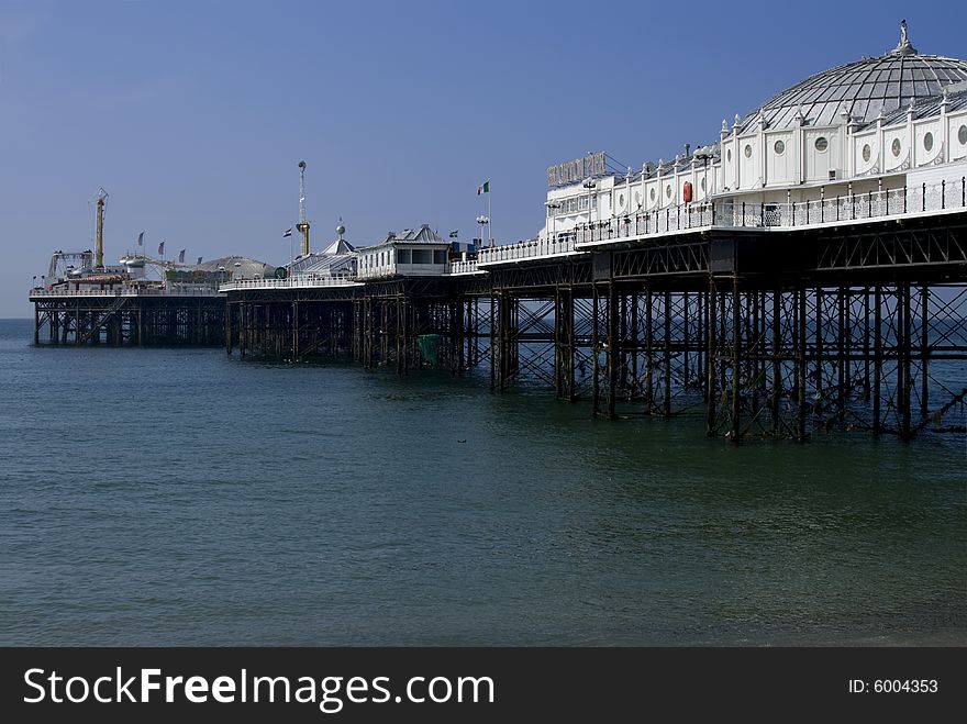 Looking down brighton pier on hot summers day