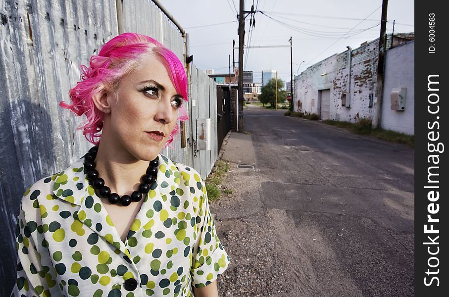 Woman With Pink Hair In An Alley