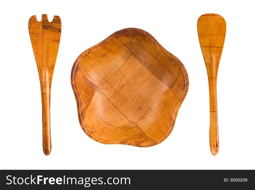 Wood plate, spoon and fork isolated on white background