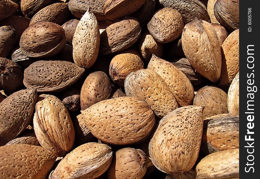 Several almonds in a basket