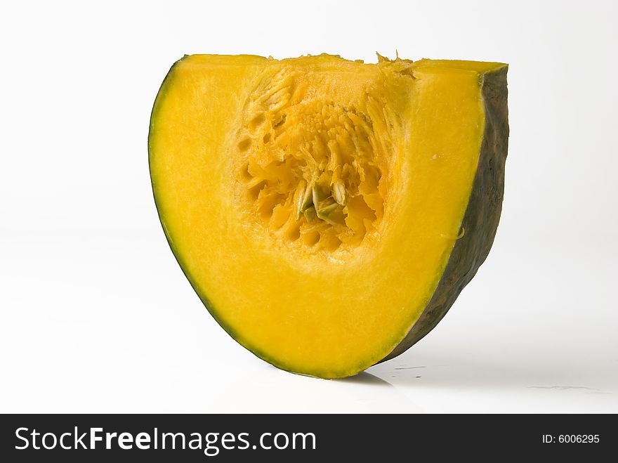 A slice of squash against white background