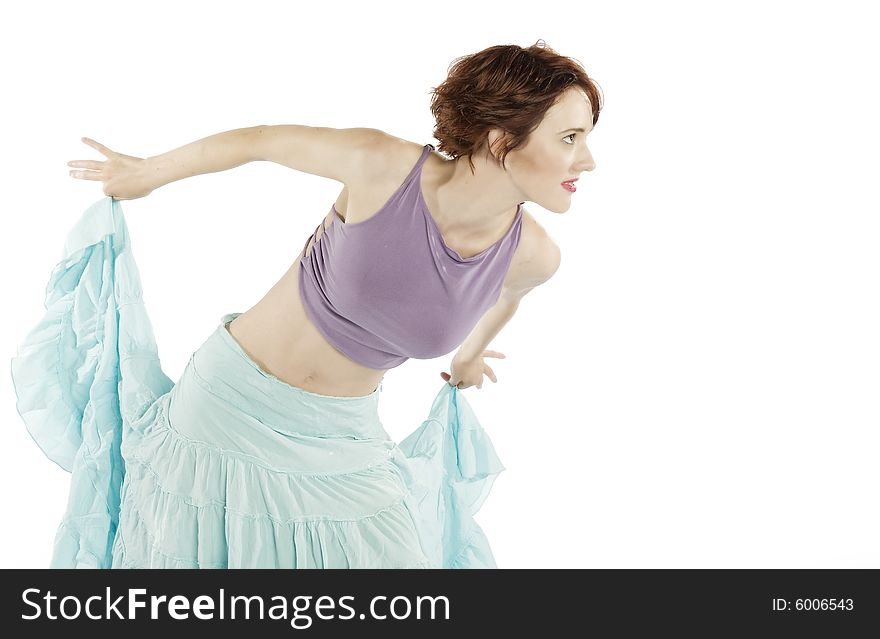 A young attractive Caucasian female dancing with joy. A young attractive Caucasian female dancing with joy.