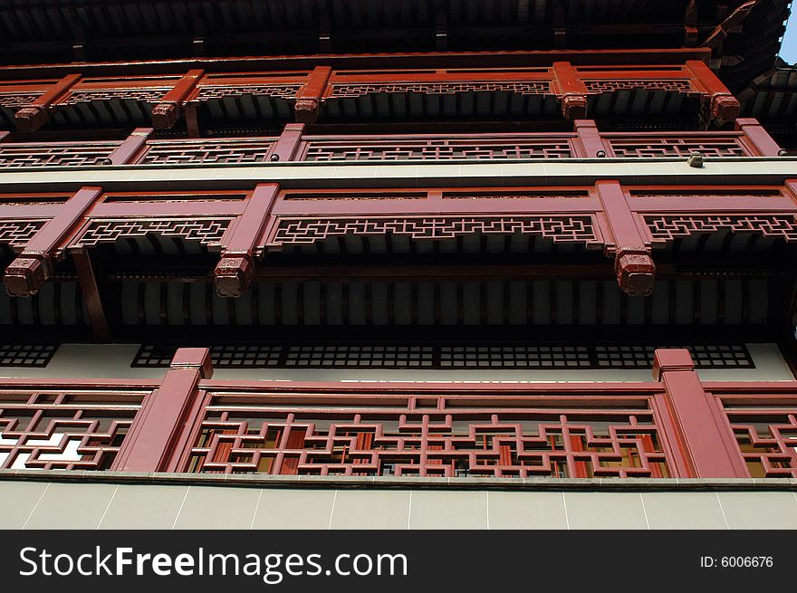 China, Shanghai city. Traditional, ancient Chinese architecture, made of wood. Pagoda in old town called YuYuan (Cheng Huang Miao). China, Shanghai city. Traditional, ancient Chinese architecture, made of wood. Pagoda in old town called YuYuan (Cheng Huang Miao).