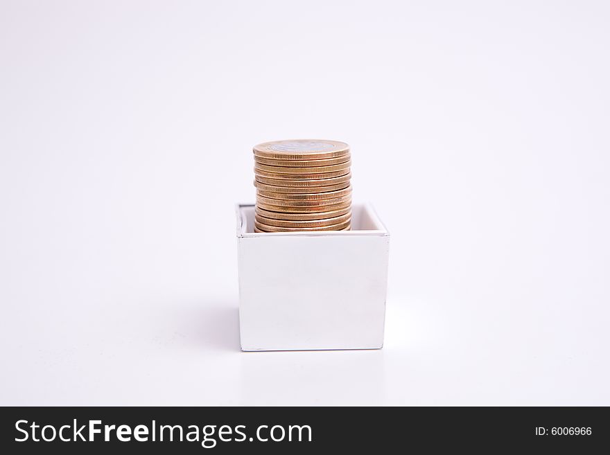 Box to gift and coin on the white background