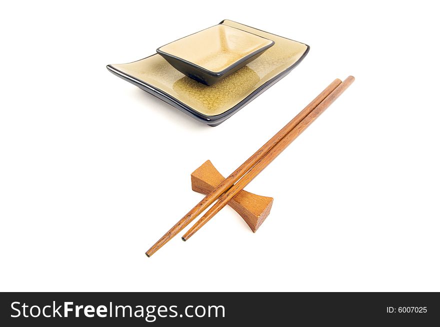 Abstract Chopsticks and Bowls Isolated on a White Background.