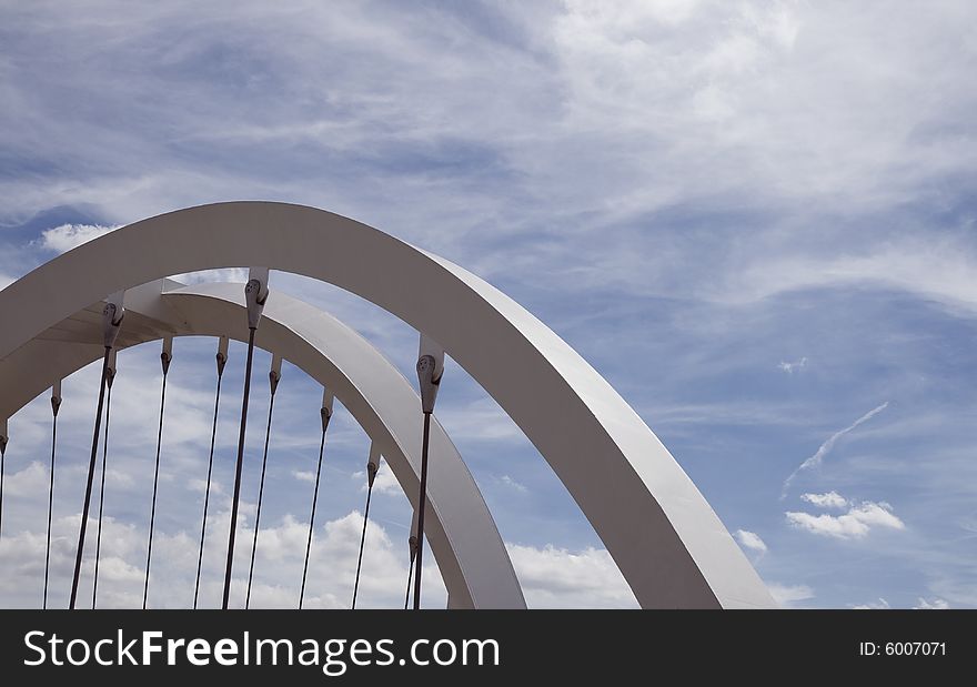 Steel arches against the blue sky. Shot from London, England. Copy space