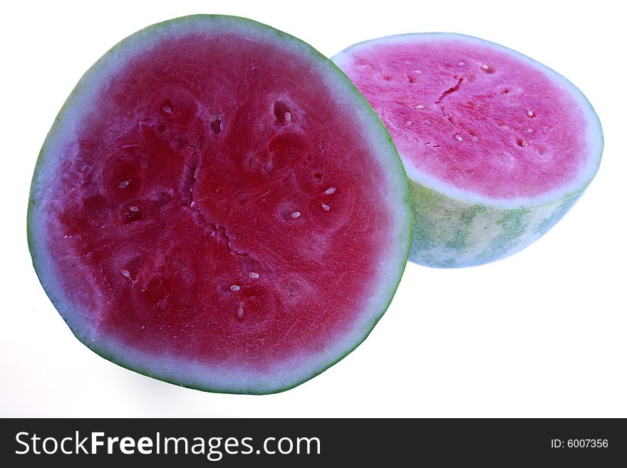 Cut ripe watermelon halves isolated