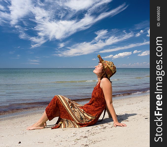 Woman become sunburnt at sea beach