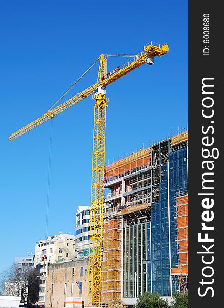 Construction crane with blue sky background