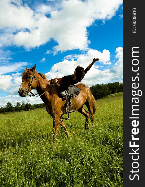 Woman and horse blue sky