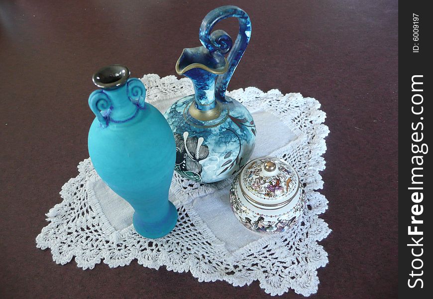 I have a small collection of miniature jugs, vases, pots, etc. The Jug and Perfume pot came from Greece and the bright turquoise ceramic vase was made by a local couple who also make very large pieces in this colour. I have a small collection of miniature jugs, vases, pots, etc. The Jug and Perfume pot came from Greece and the bright turquoise ceramic vase was made by a local couple who also make very large pieces in this colour.