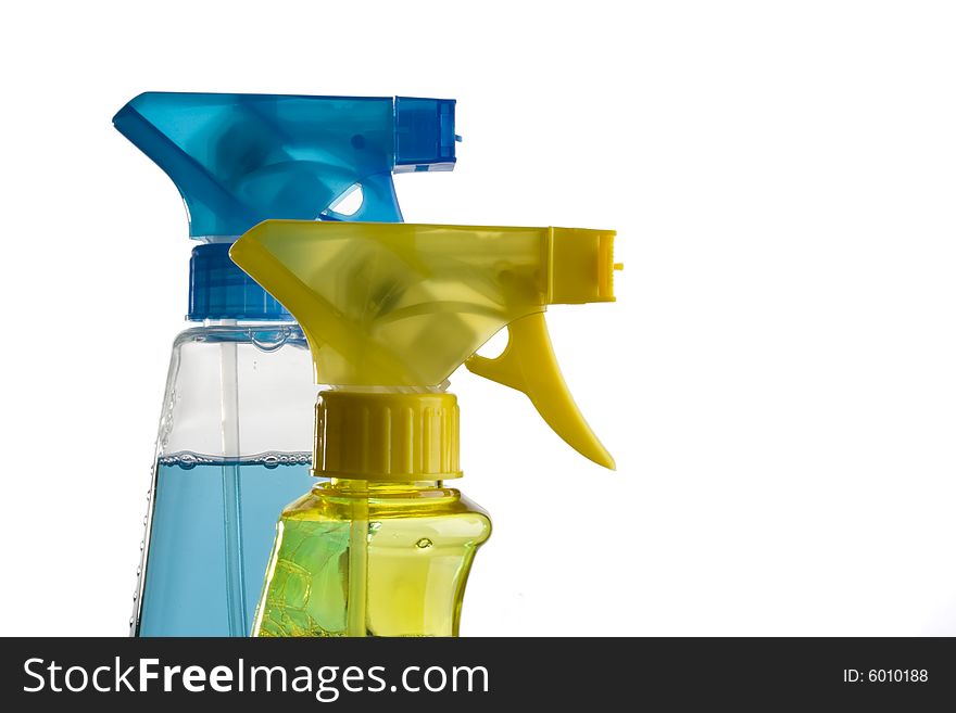 Blue and yellow trigger spray bottles