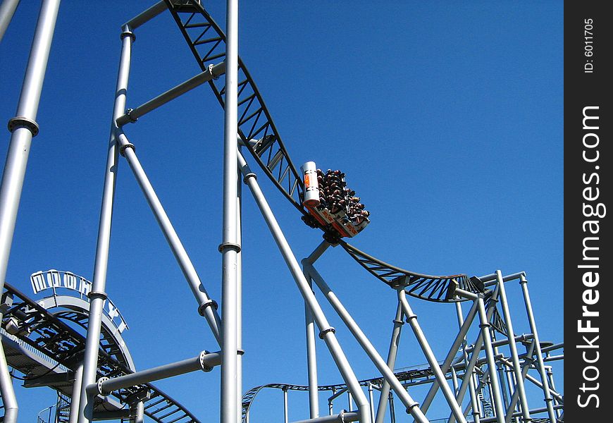 A nice view on a rollercoaster going through a Corkscrew giving the people inside a nice adrenaline rush. this was one extreme coaster!