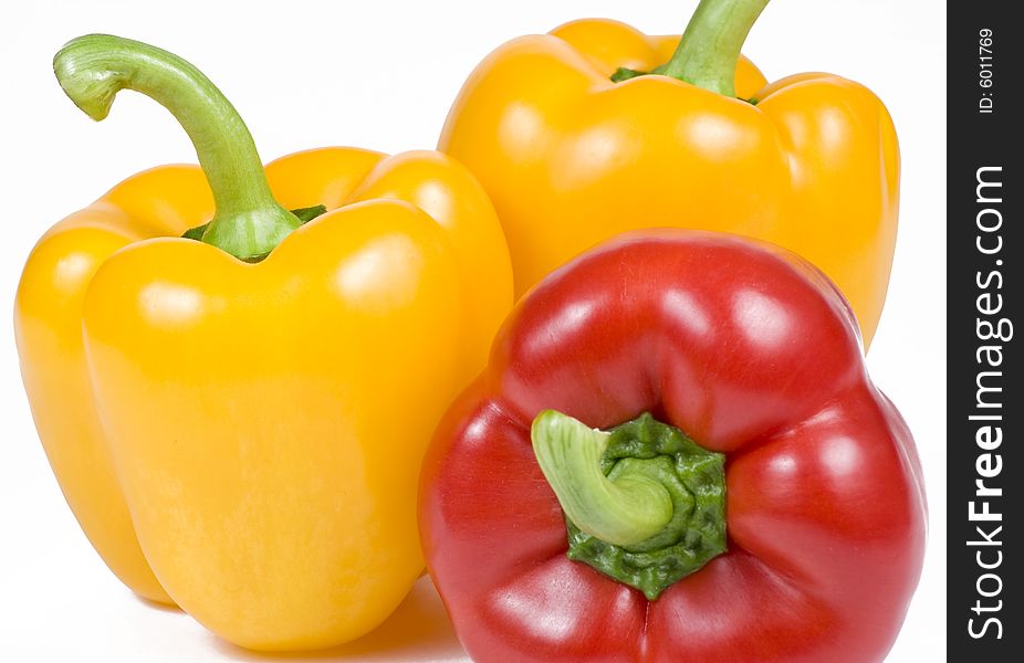 Yellow and red Bell Peppers on White Background