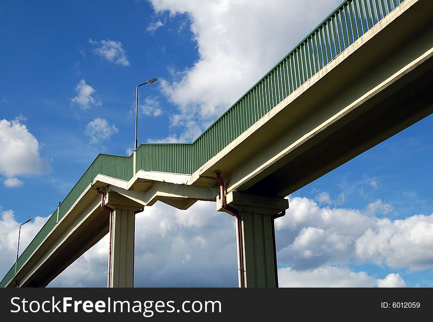 Modern long bridge and blue sky. Modern long bridge and blue sky