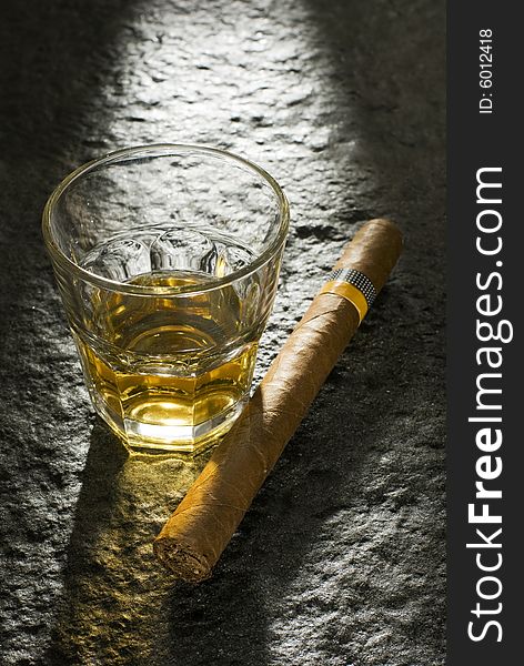 Whiskey and cuban cigar close up shoot