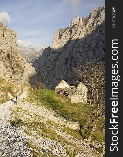 Path in mountains with golden light. Path in mountains with golden light