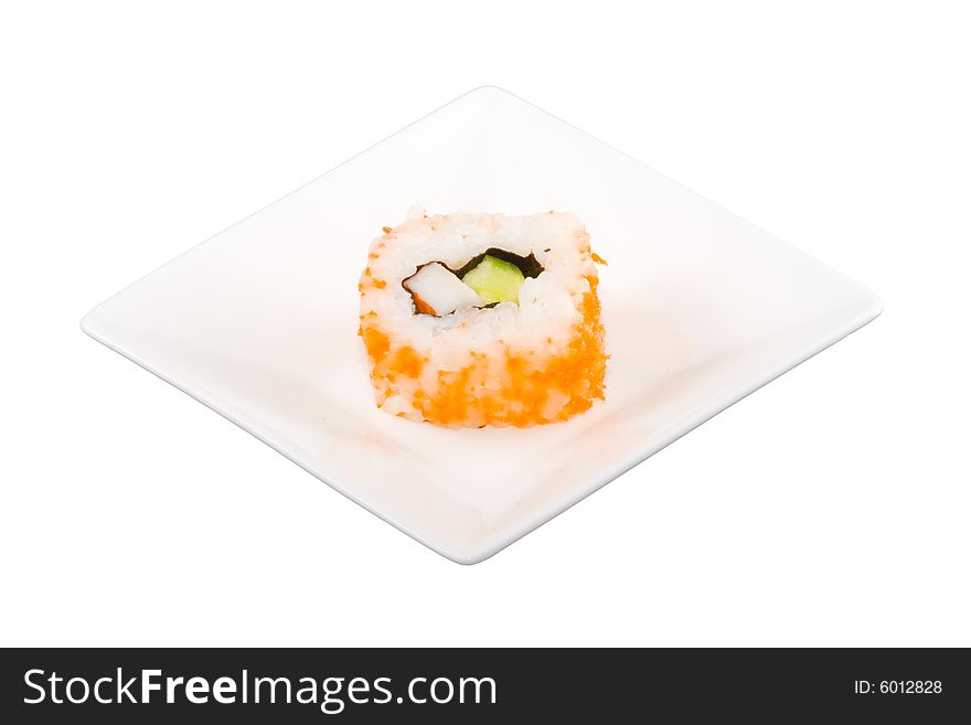 A square white plate with a piece of sushi