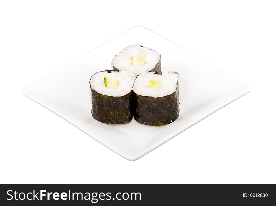 A square white plate with three pieces of sushi