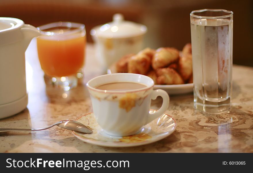 Cup of coffee and glass of mango juice. Cup of coffee and glass of mango juice