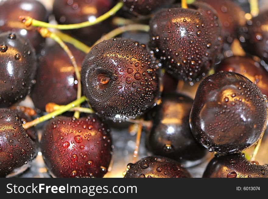 Close up of sweet fresh cherry with water drops. Close up of sweet fresh cherry with water drops