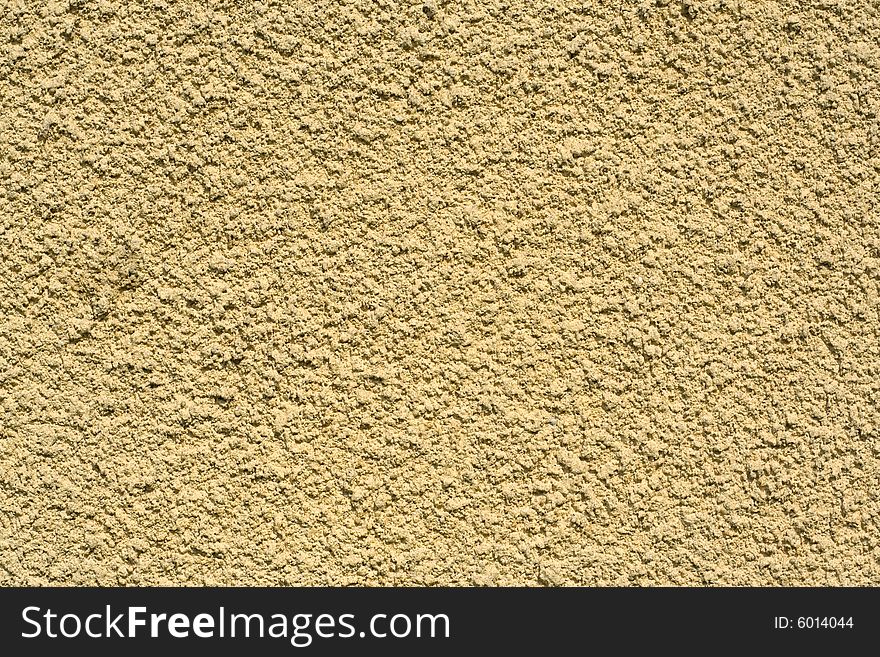Fragment of the plastered wall, abstract background. Fragment of the plastered wall, abstract background