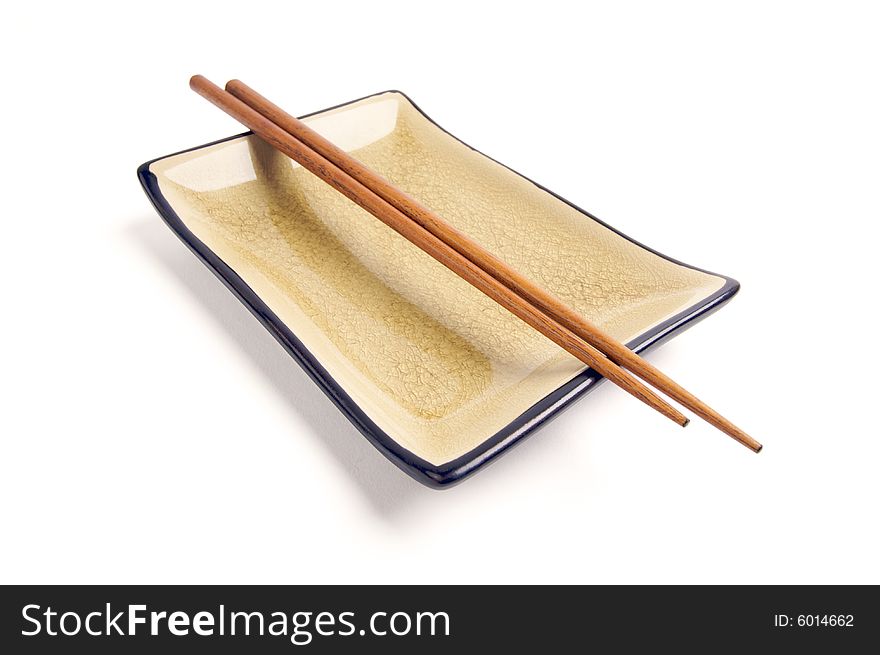 Abstract Chopsticks and Bowl Isolated on a White Background.