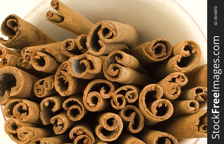 Close up of cinnamon sticks in a cup